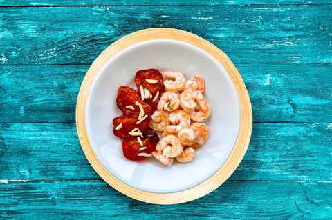 gamberetti con pomodori e scaglie di mandorle