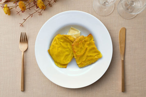 cotoletta alla valdostana con formaggio e prosciutto cotto