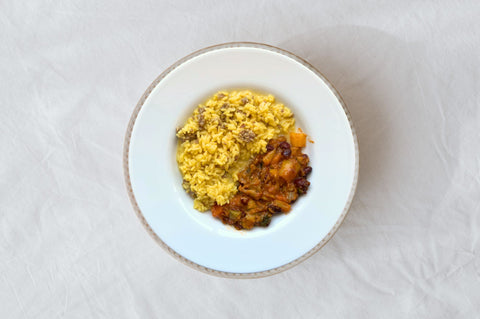 risotto alla milanese con salsiccia e contorno di verdure stufate